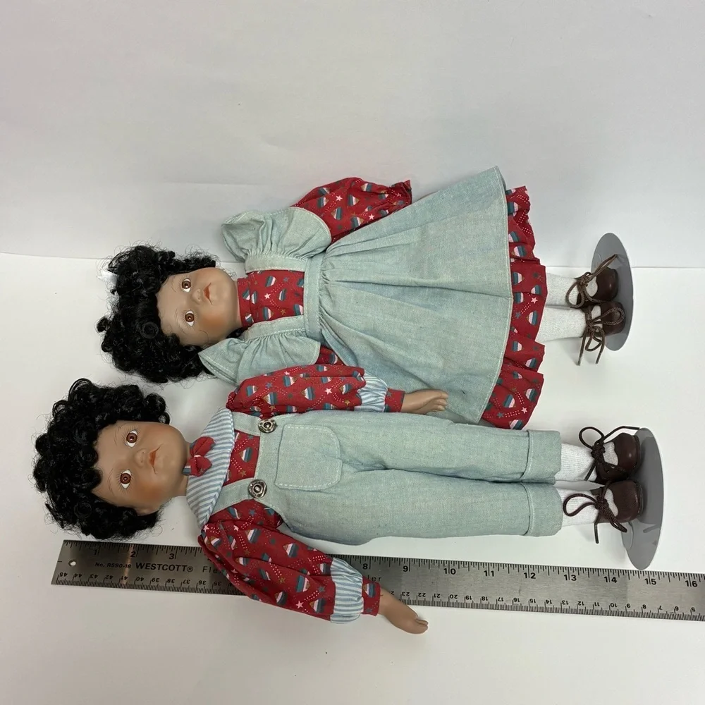 Delton Product Corp. Porcelain Brown Boy Girl Dolls Stands Matching Outfits